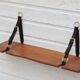Elm and leather shelf, distributed by the Maison et Jardin Gallery in the 60