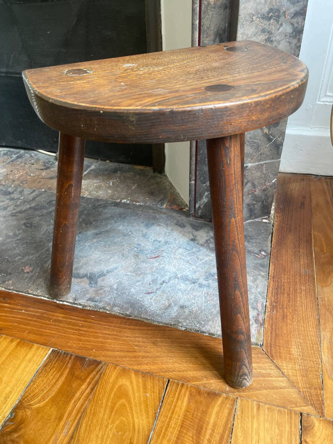 Dark wood tripod stool