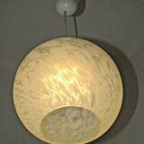 French suspended ceiling light in the shape of a white ball, Clichy 3336 glass shade.