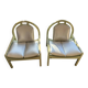 Pair of Argos armchairs by Baumann in green and silver leather.