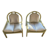 Pair of Argos armchairs by Baumann in green and silver leather.