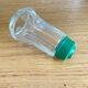 Vintage salt shaker with green Bakelite cap