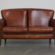 Classic 2 seater sheepskin sofa with beautiful colours and good seating comfort