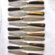Set of 12 antique table knives from 1900 with horn handles and forged steel blades, Paris, 24.5 cm long.