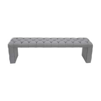 Grey padded bench