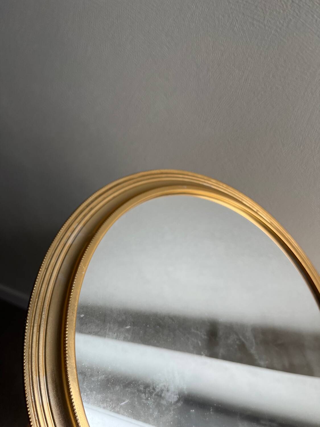 Vintage gold round mirror