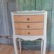 Vintage wooden bedside table with 3 drawers.