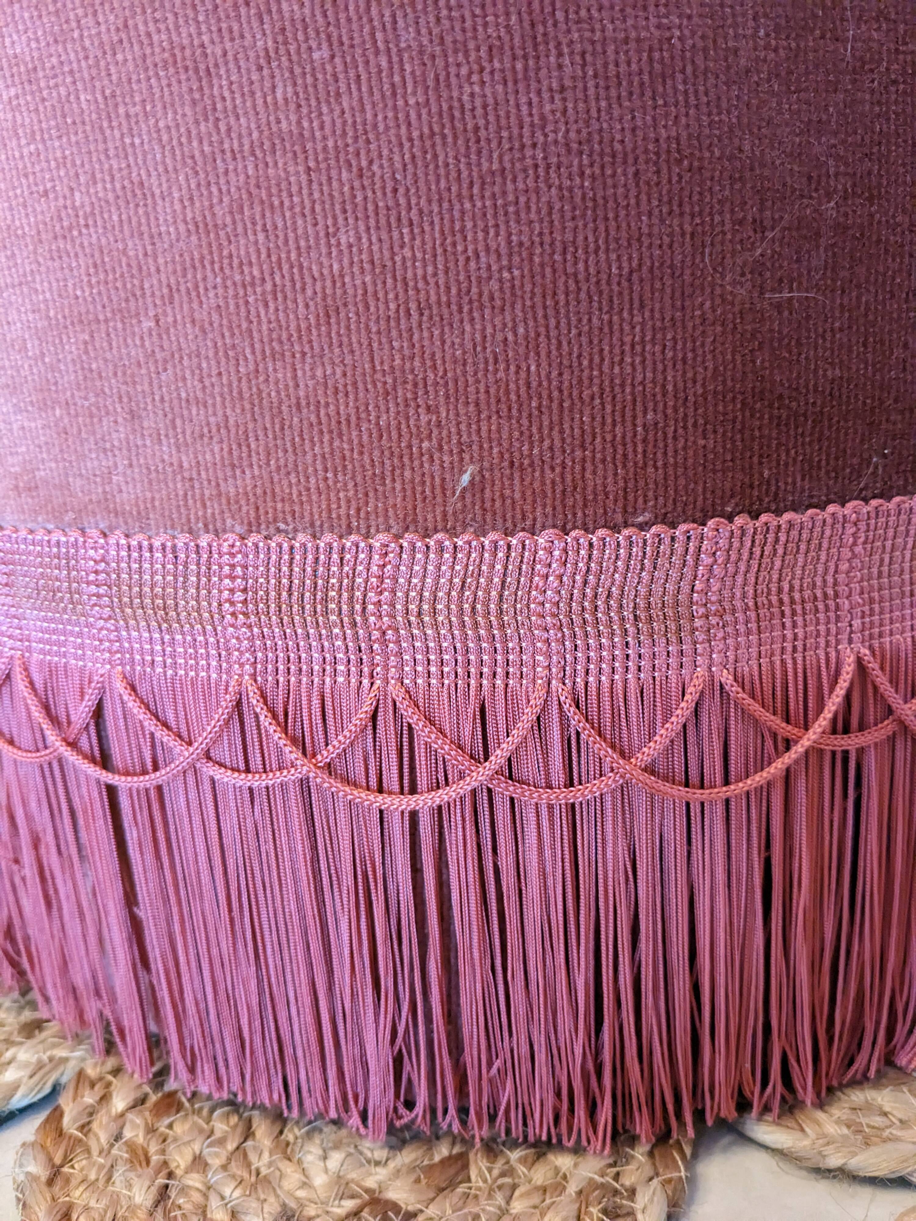 Pouf or footrest in pink velvet with fringes