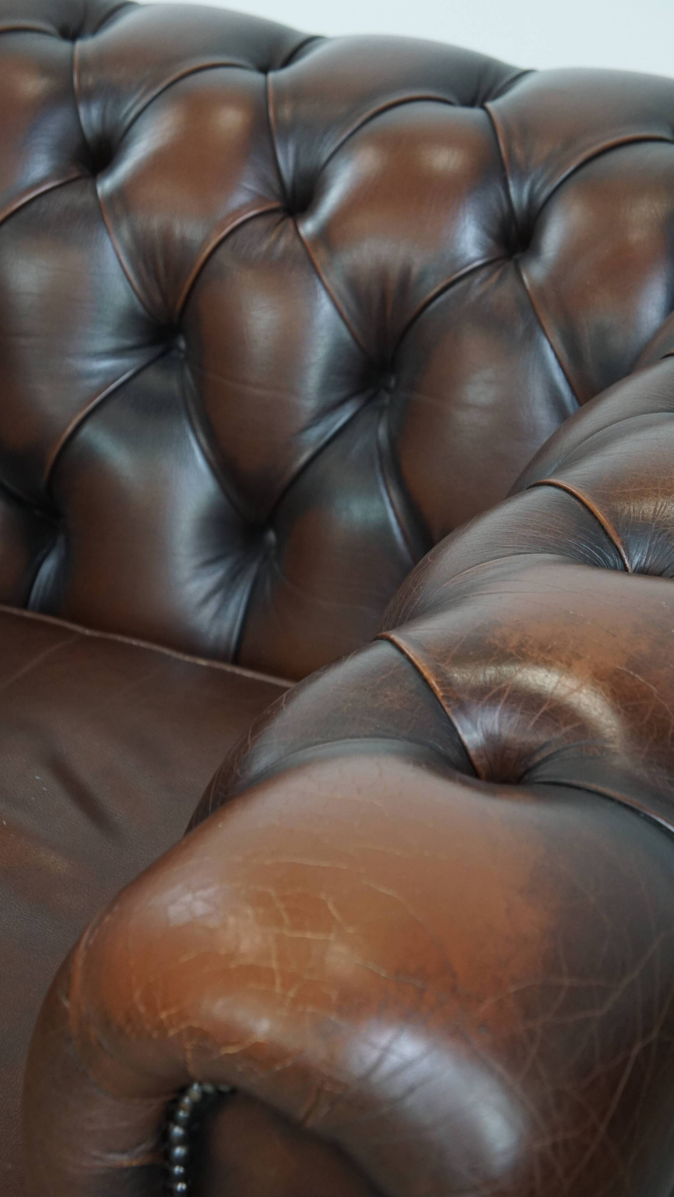 Dark brown English cowhide leather chesterfield armchair
