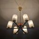 Lustre Mid Century Modern with 6 brass arms, teak, and frosted glass.