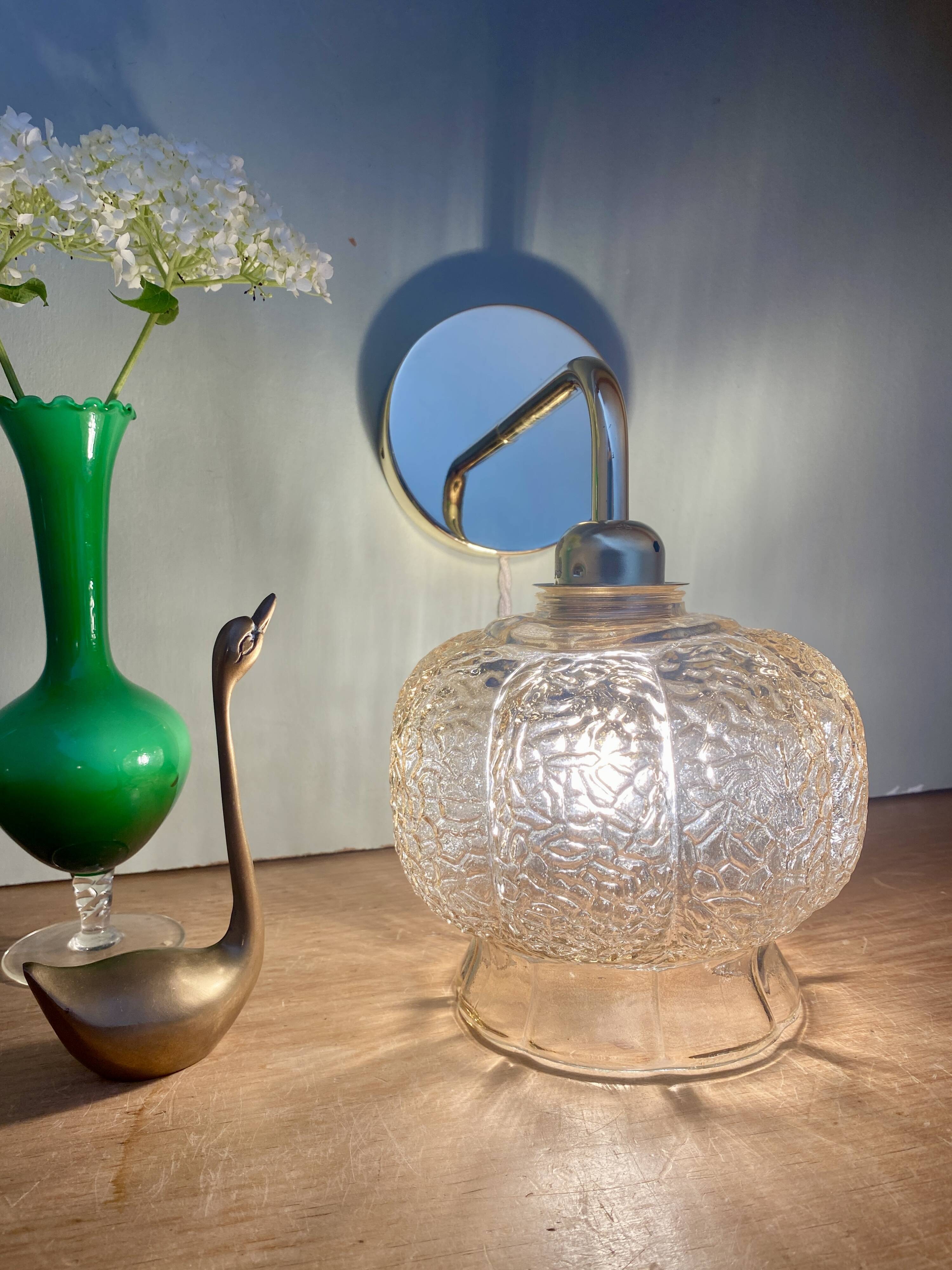 Vintage golden globe angled wall light in amber glass