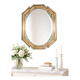 Vintage octagonal mirror, molar glass, patinated green silvering, floral decoration.