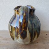 Ceramic pitcher in the shape of a coloquinte melo.