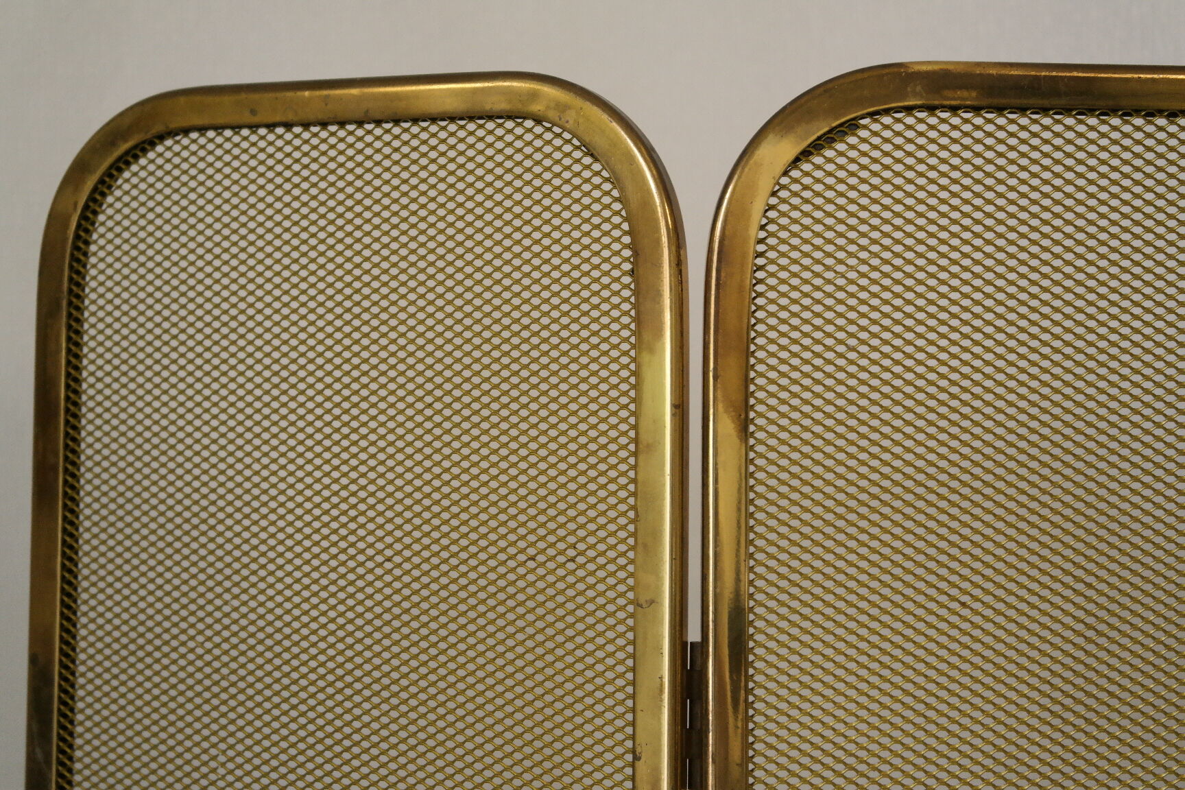 Vintage brass chimney firewall