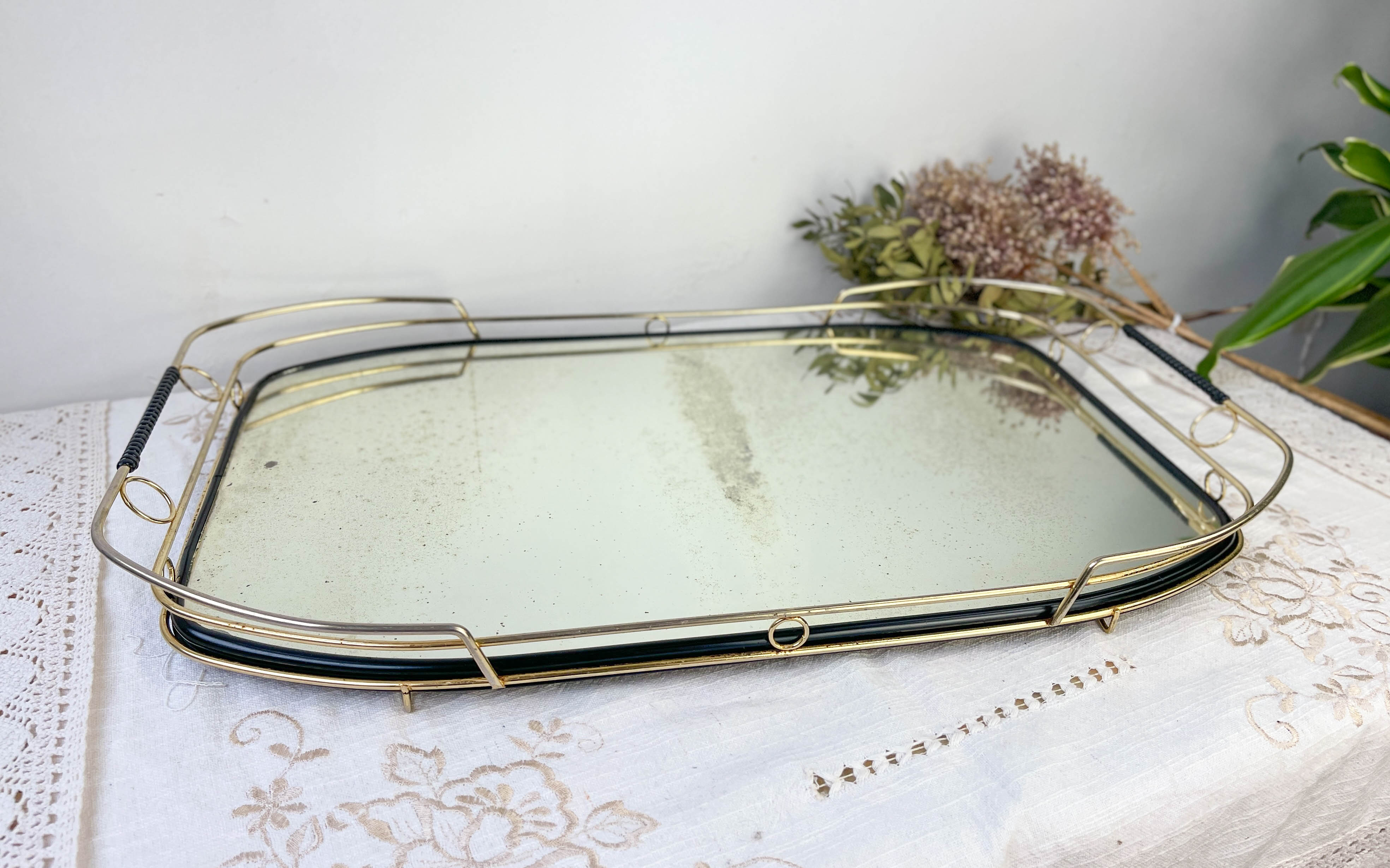Art Deco style mirror and brass serving tray
