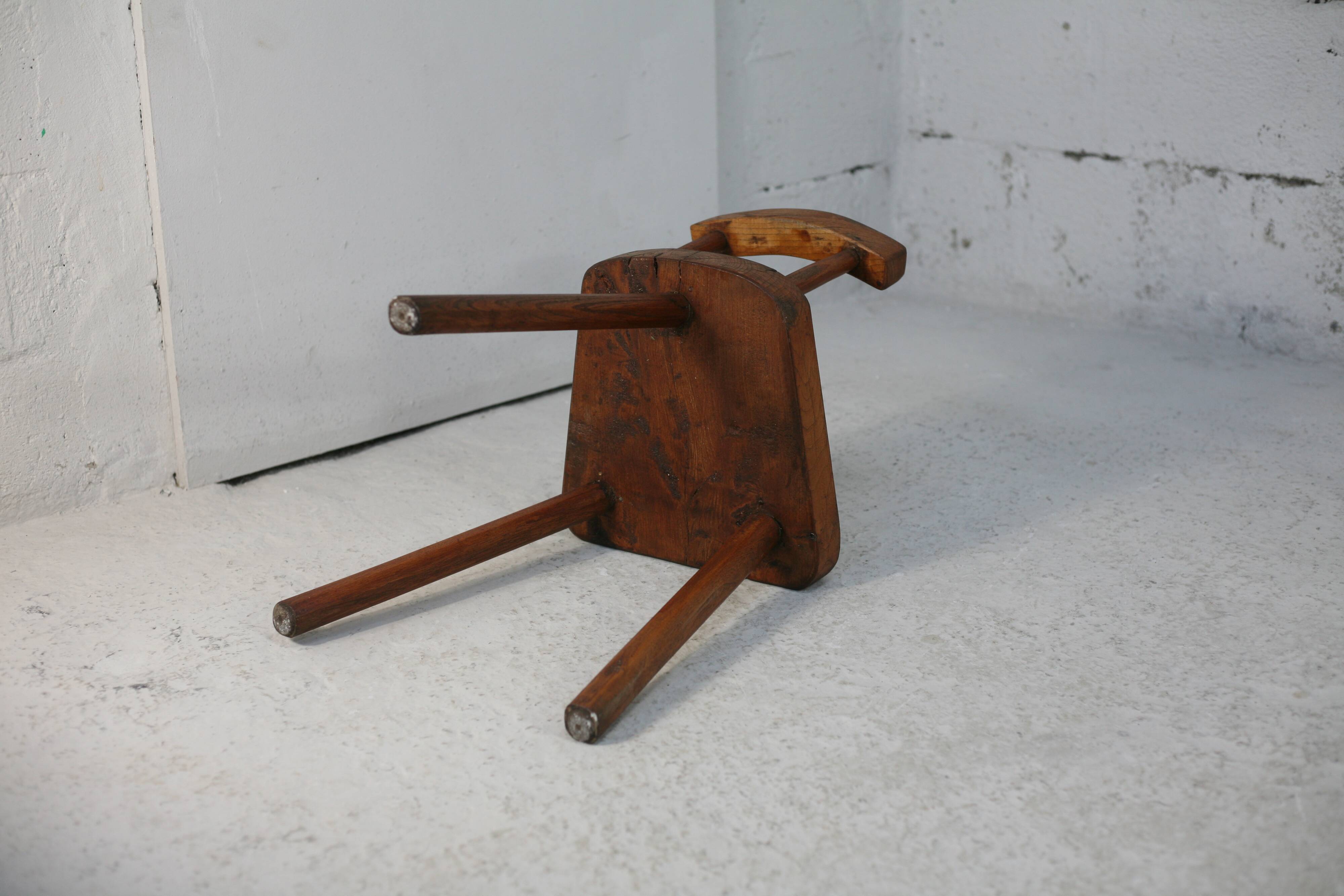 Pair of tripod stools with brutalist backrests, France, circa 1960