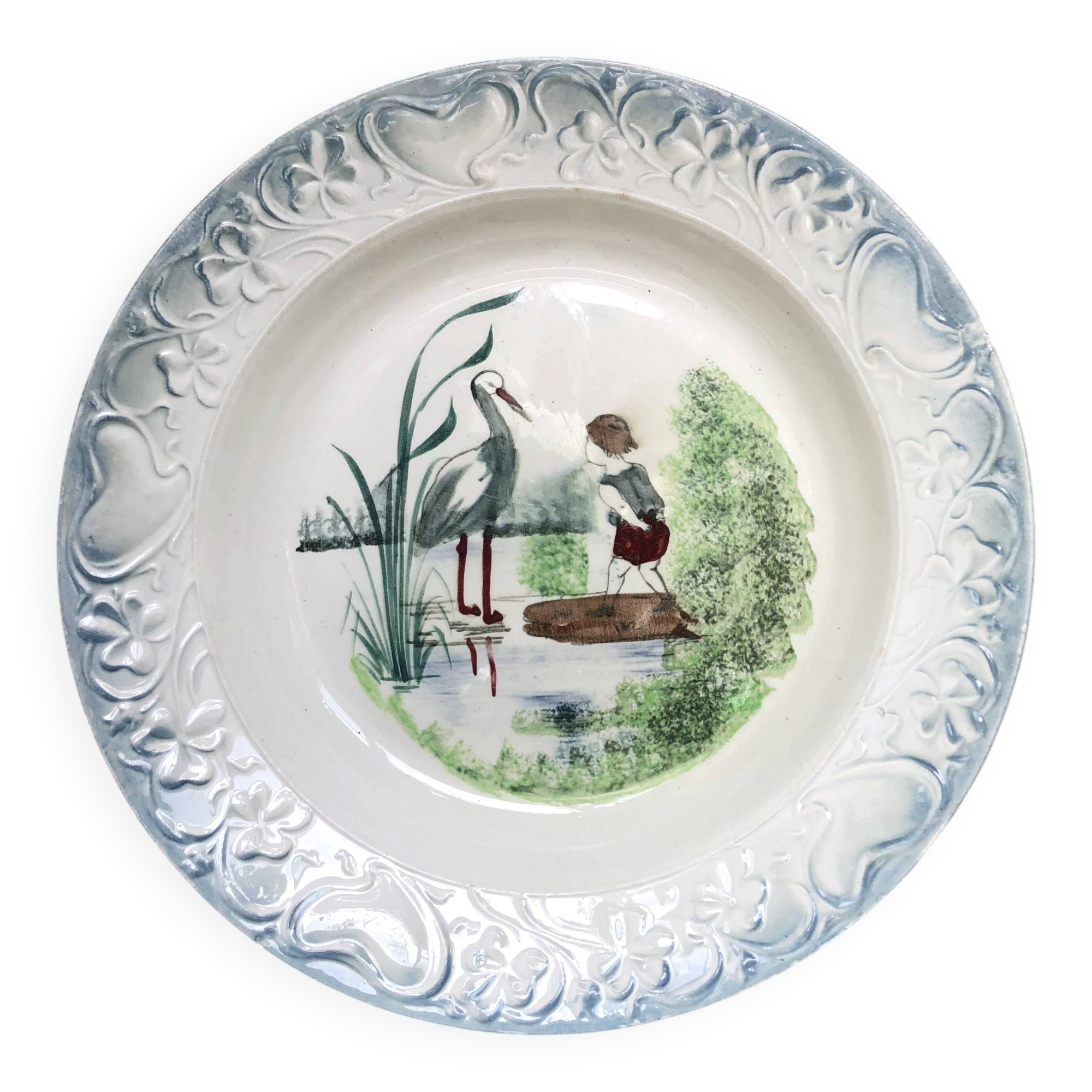Vintage hollow serving dish with a decoration: marsh landscape.