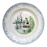Vintage hollow serving dish with a decoration: marsh landscape.