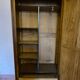 Antique wardrobe with one door and mirror.