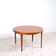 Round dining table in teak by Ib Kofod Larsen for Faarup Mobelfabrik