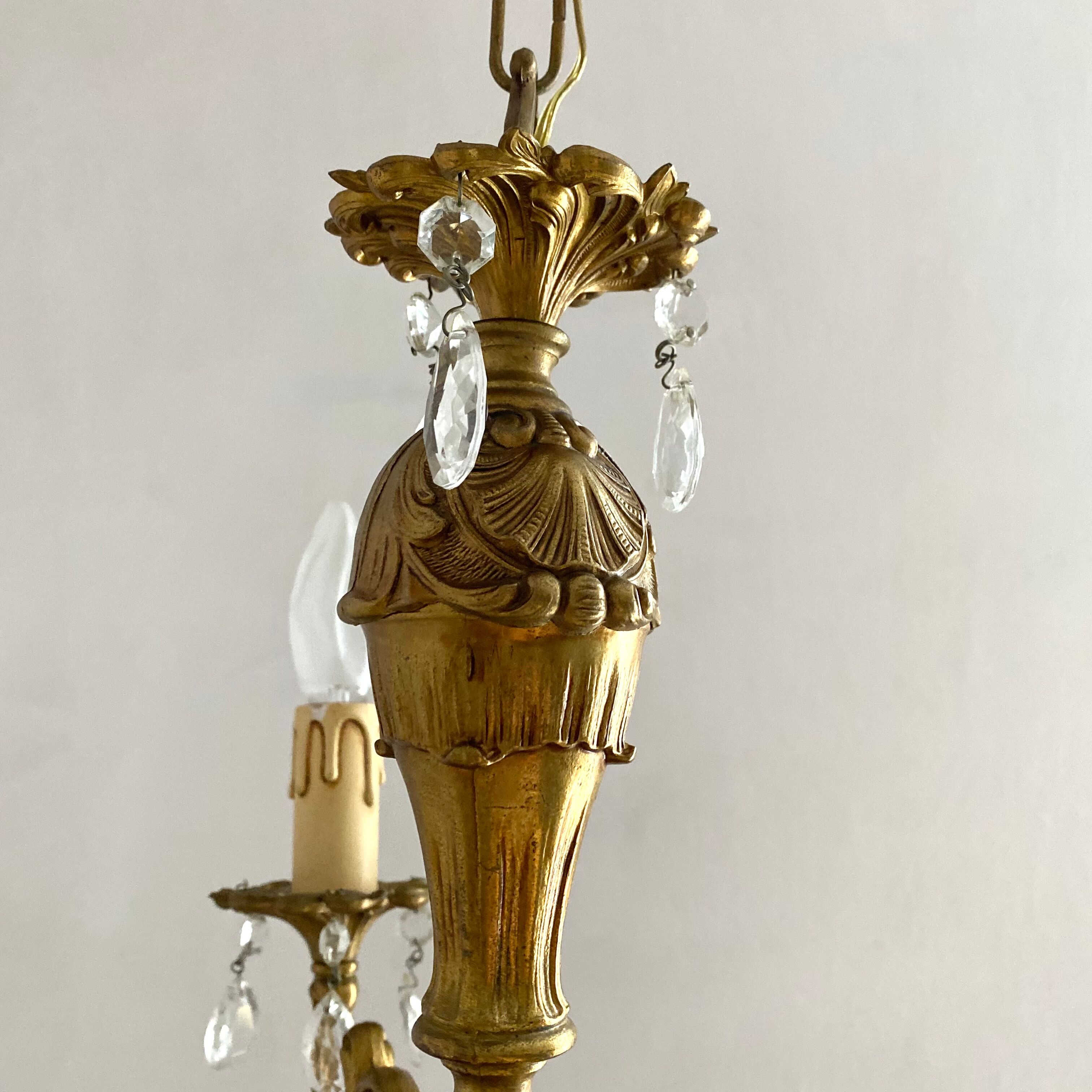 Chandelier with tassels and brass