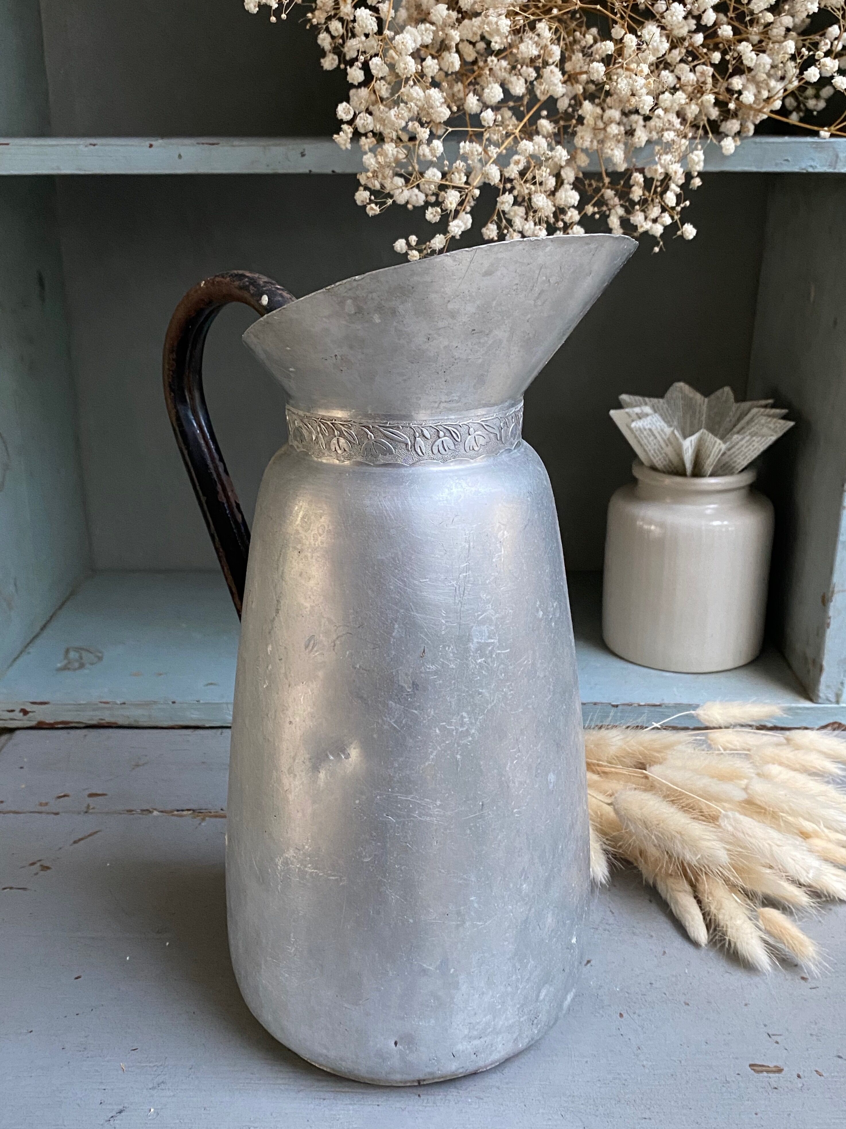 Tin pitcher
