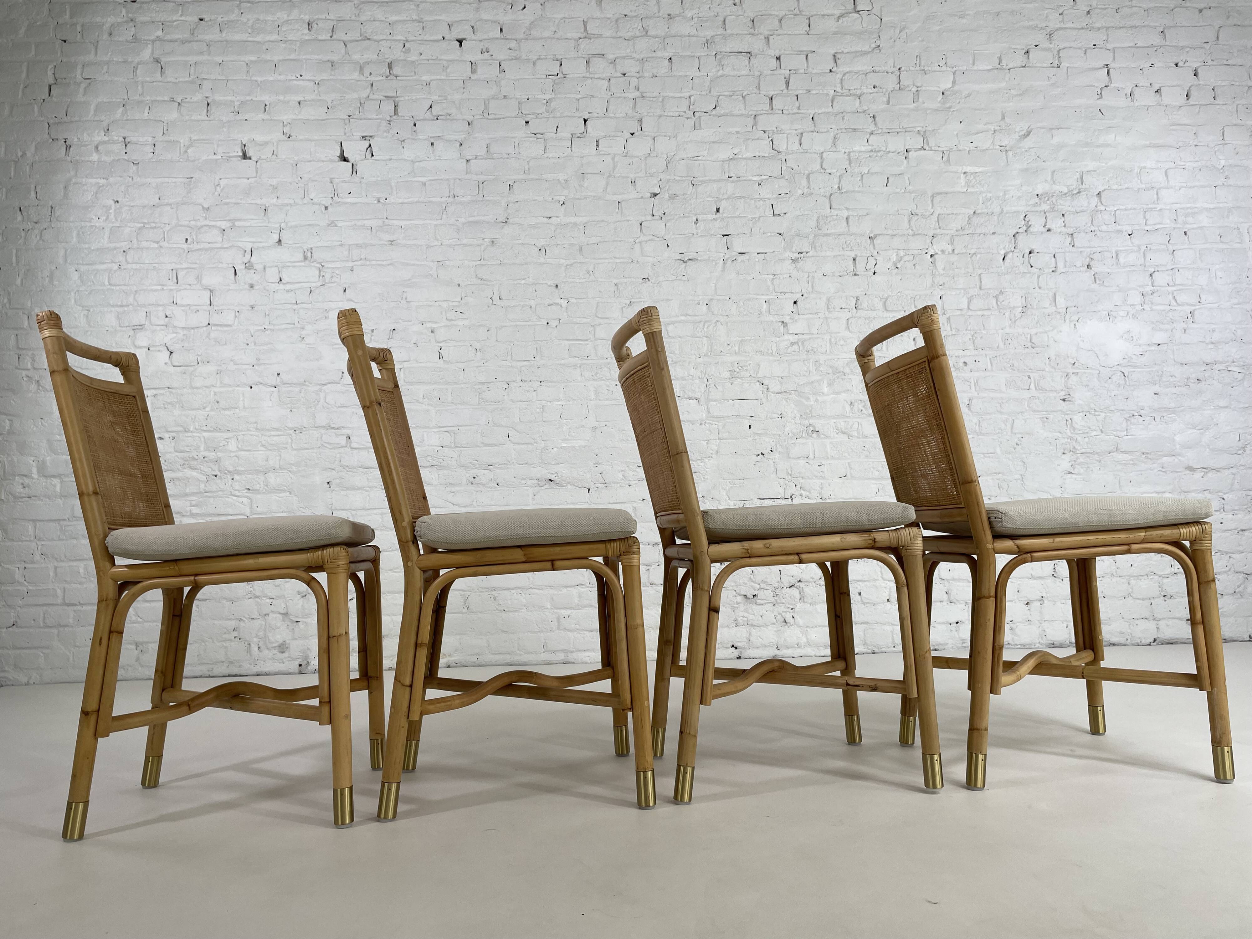 Suite de 4 chaises en rotin cannage et laiton
