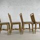 Suite de 4 chaises en rotin cannage et laiton