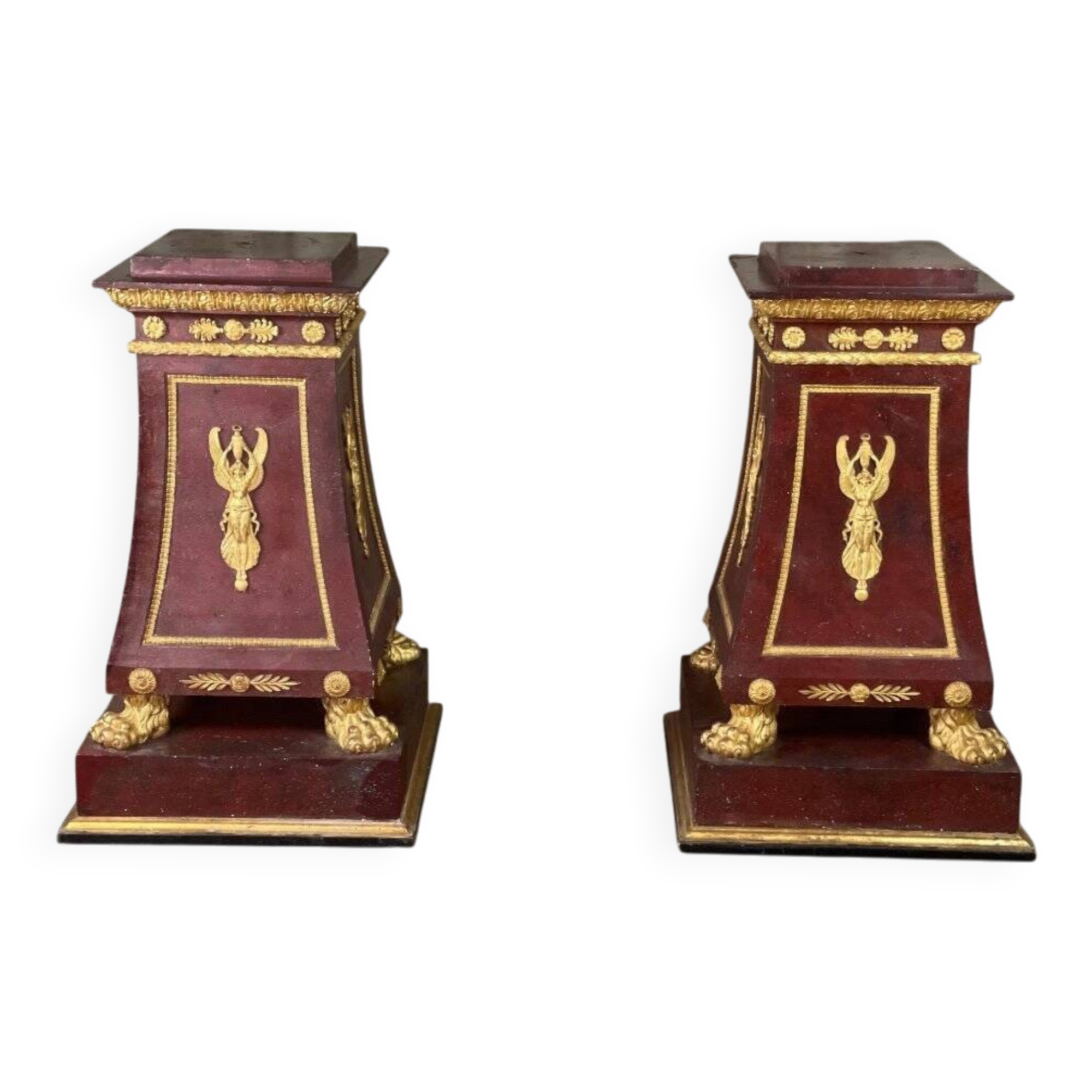 Pair of plaster bases imitating porphyry and gilded bronze circa 1980.