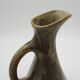 Denbac pitcher mounts lion paws