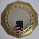 Vintage Moroccan mirror in hammered brass with openwork decoration, 22 cm