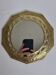 Vintage Moroccan mirror in hammered brass with openwork decoration, 22 cm