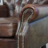 Classic grained cognac colored cowhide leather Chesterfield armchair
