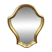Mirror with a wavy shape, wood and gilded stucco