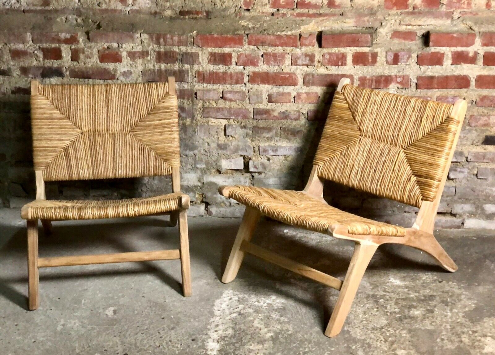 Low armchair in raw teak with seat and mulched backrest