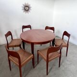 Round teak table with Scandinavian design extensions from the 60s vintage