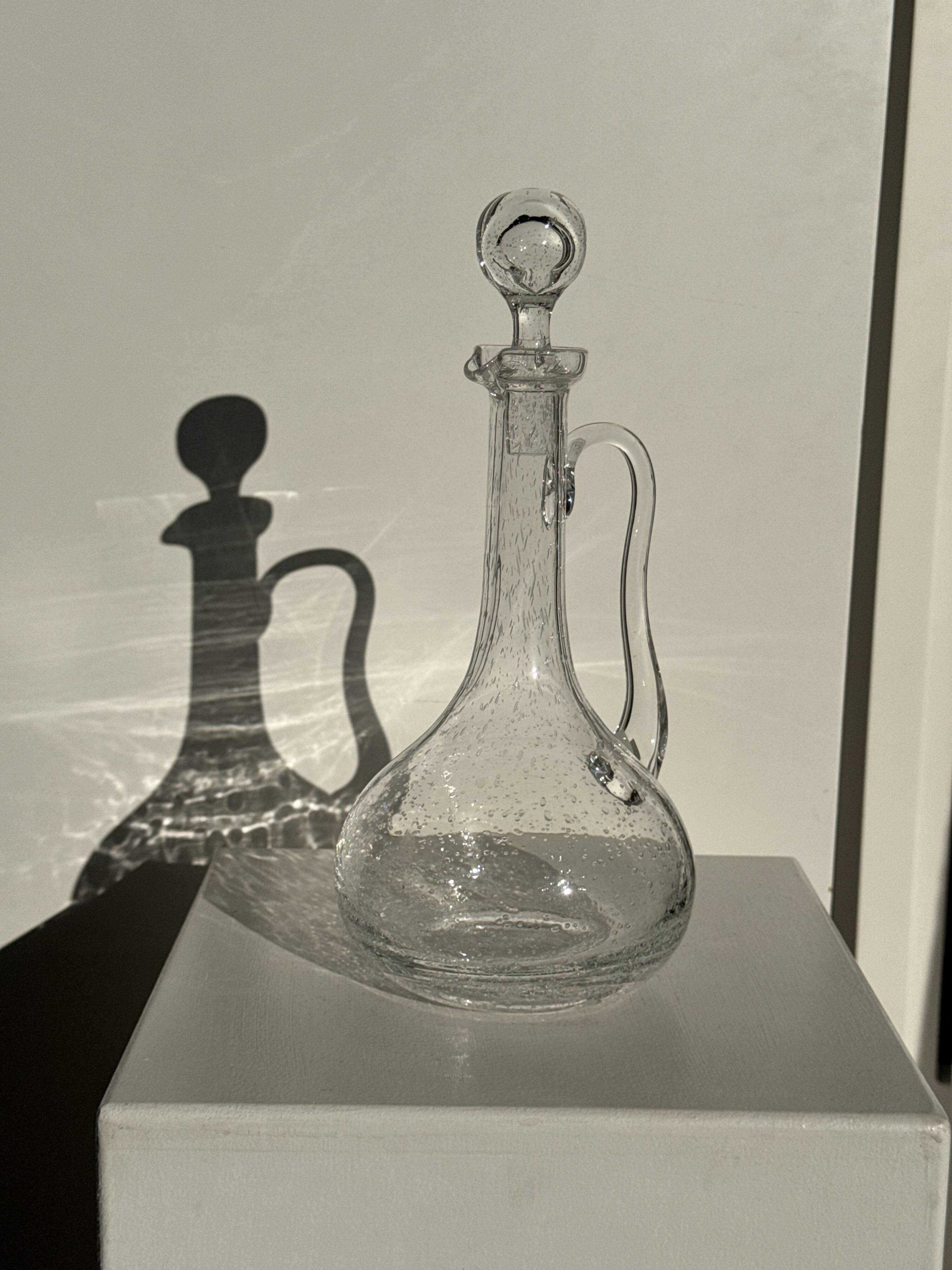Large transparent glass carafe with a Biot stopper H32 D14.5