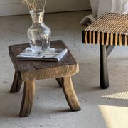 Small stool, rectangular solid teak side table with curved legs.