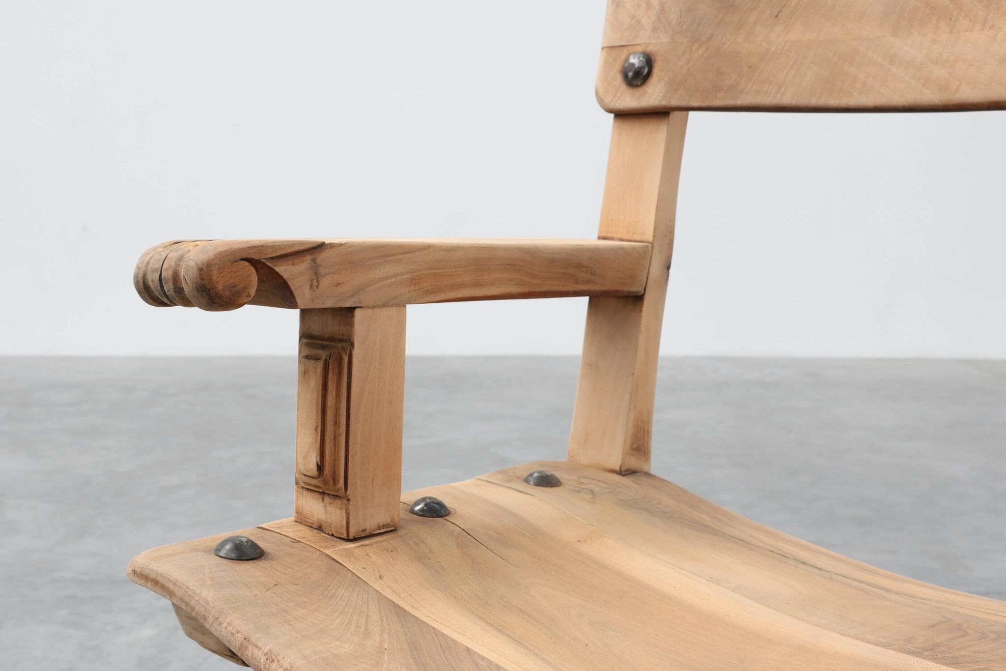 Brutalist armchair with carved rosettes and nailed wooden seat, Spain, 20th