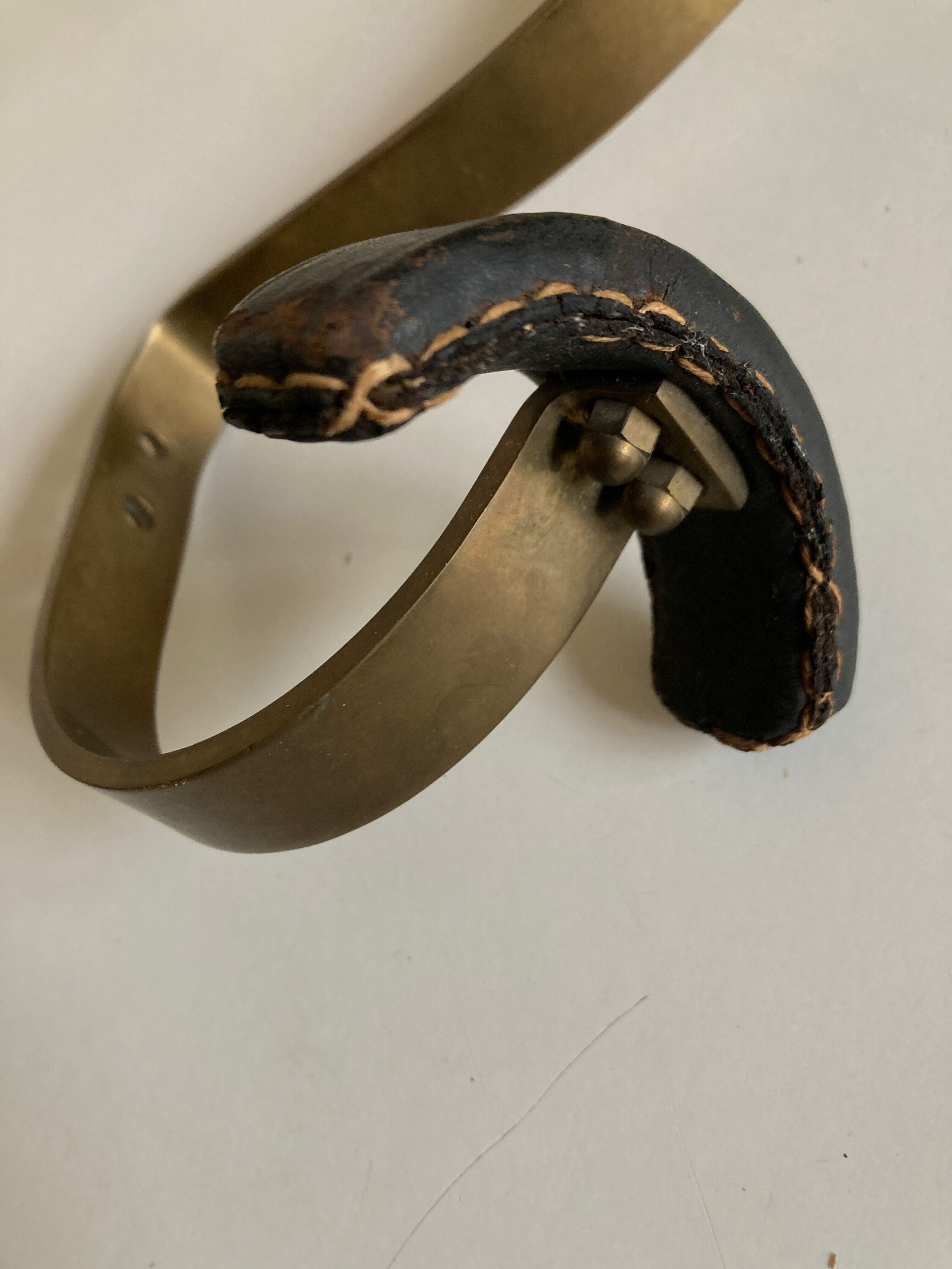 Adnet hook in bronze and leather 1950