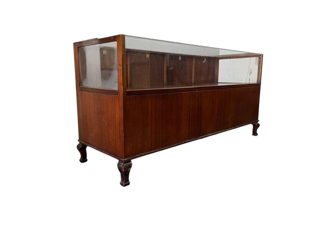 Vintage wooden shop counter/display case.