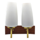 Duo of vintage wooden wall lights with white opaque glass lampshade.