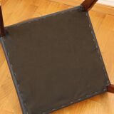 4 Scandinavian chairs in wood and faux leather, 1970.