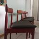 Four Danish mid-century teak armchairs.