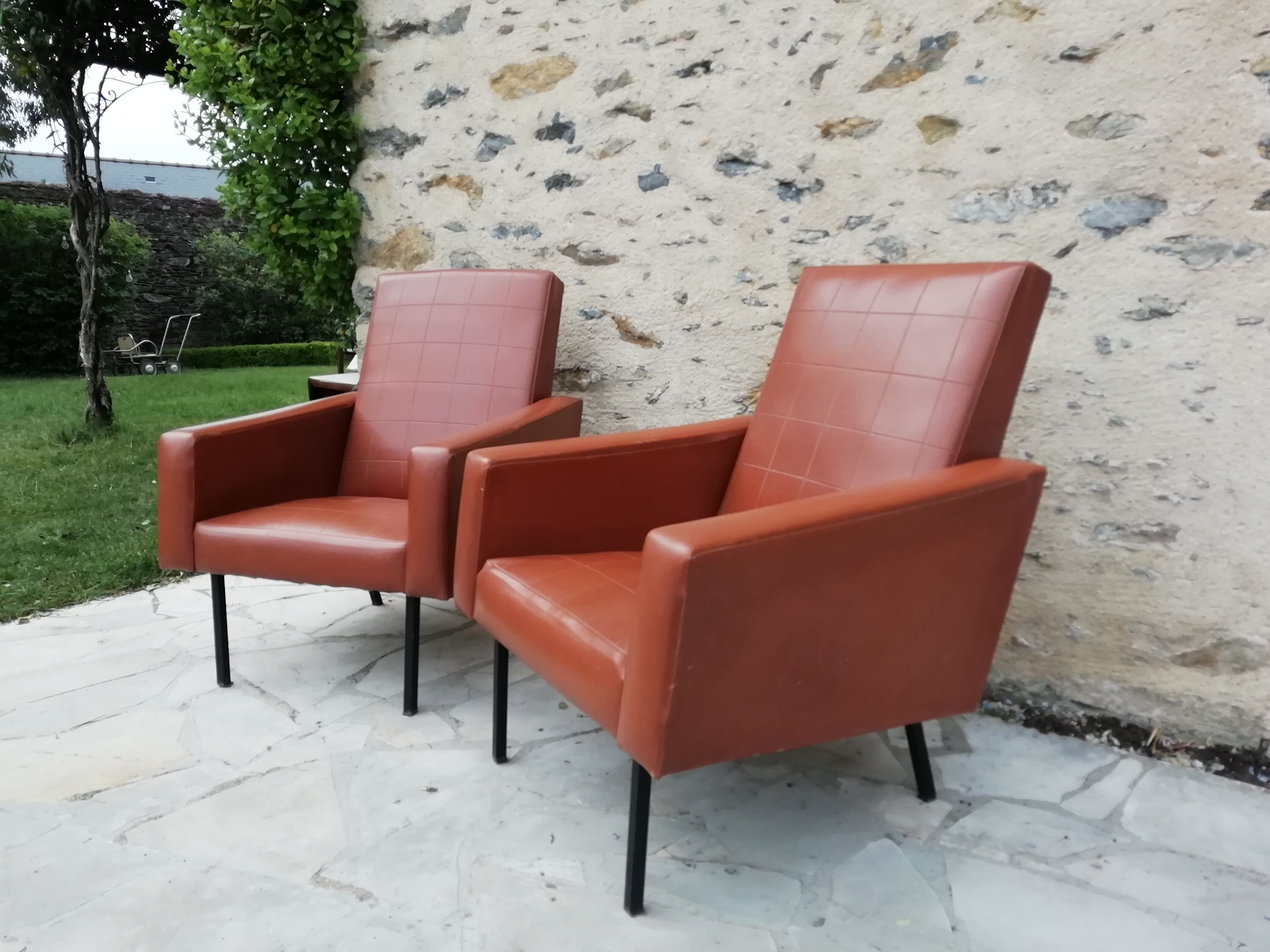 Pair of brown leather faux armchair
