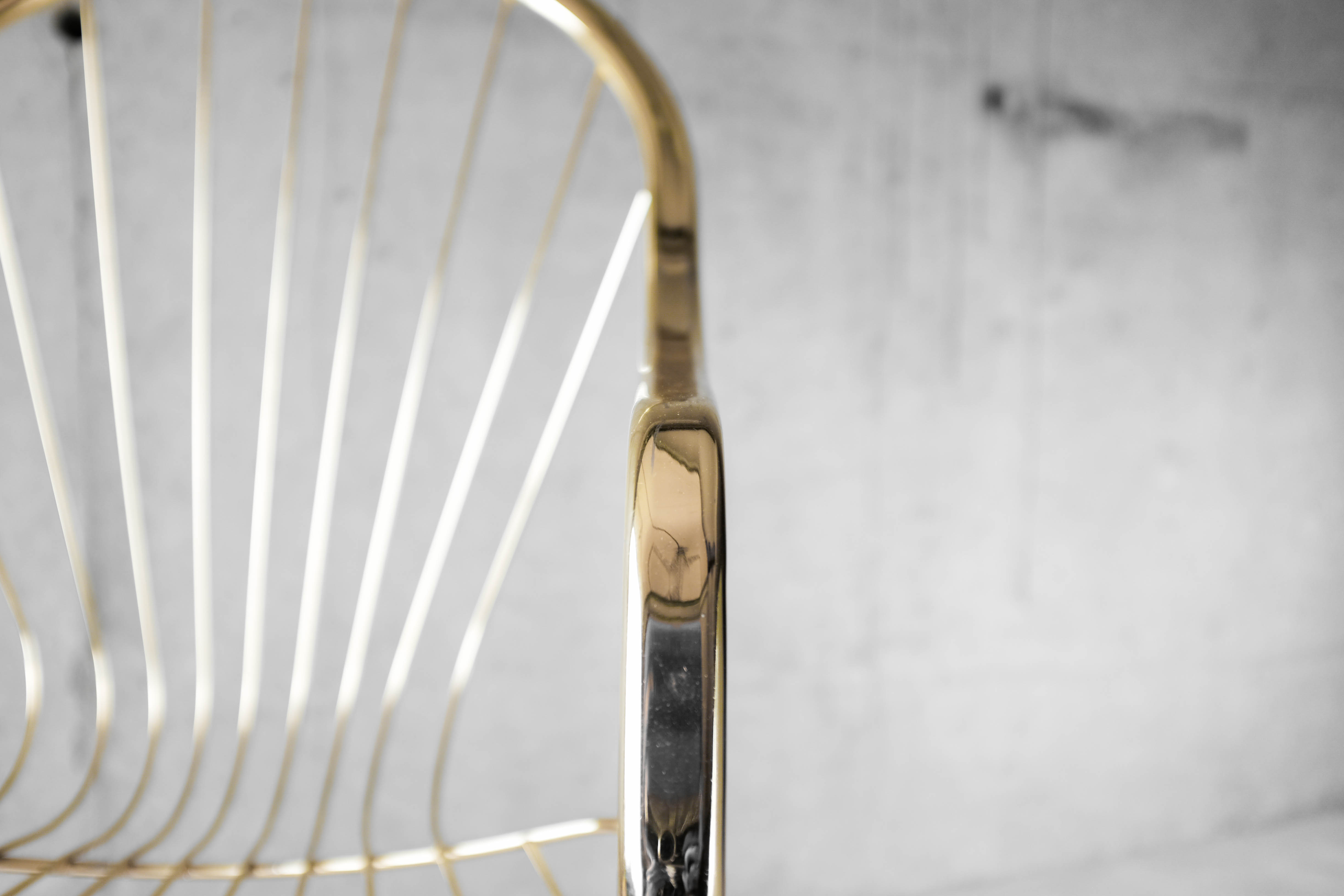 Golden metal armchair 70s