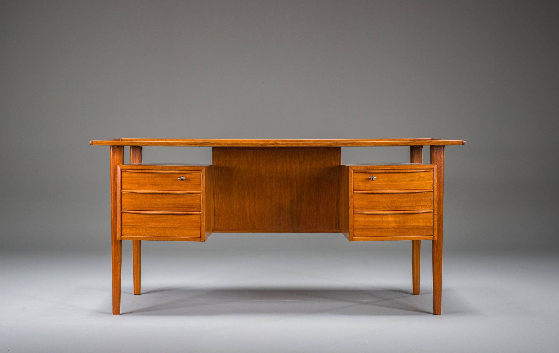 Danish teak desk by Peter Lovig Nielsen for Hedensted Mobelfabrik, 1974