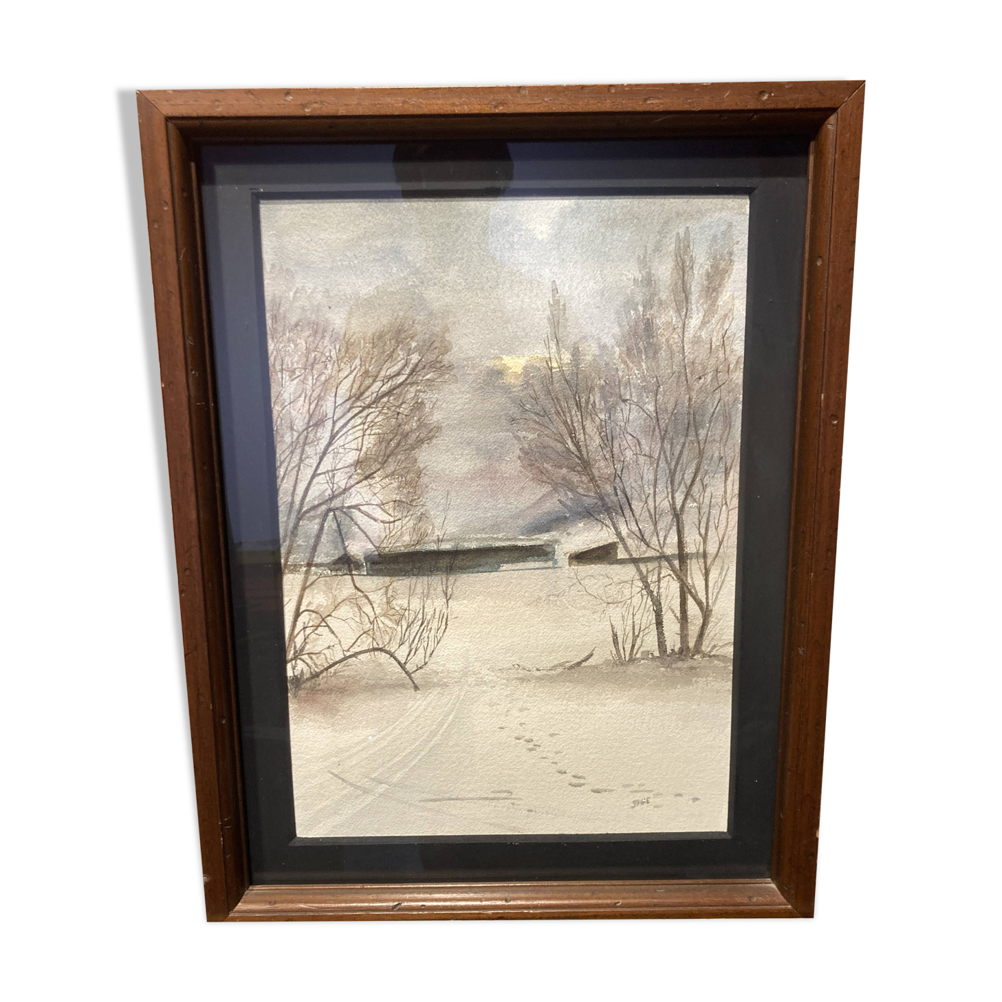 Watercolor framed by a snowy landscape