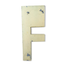 Vintage yellow sign letter F