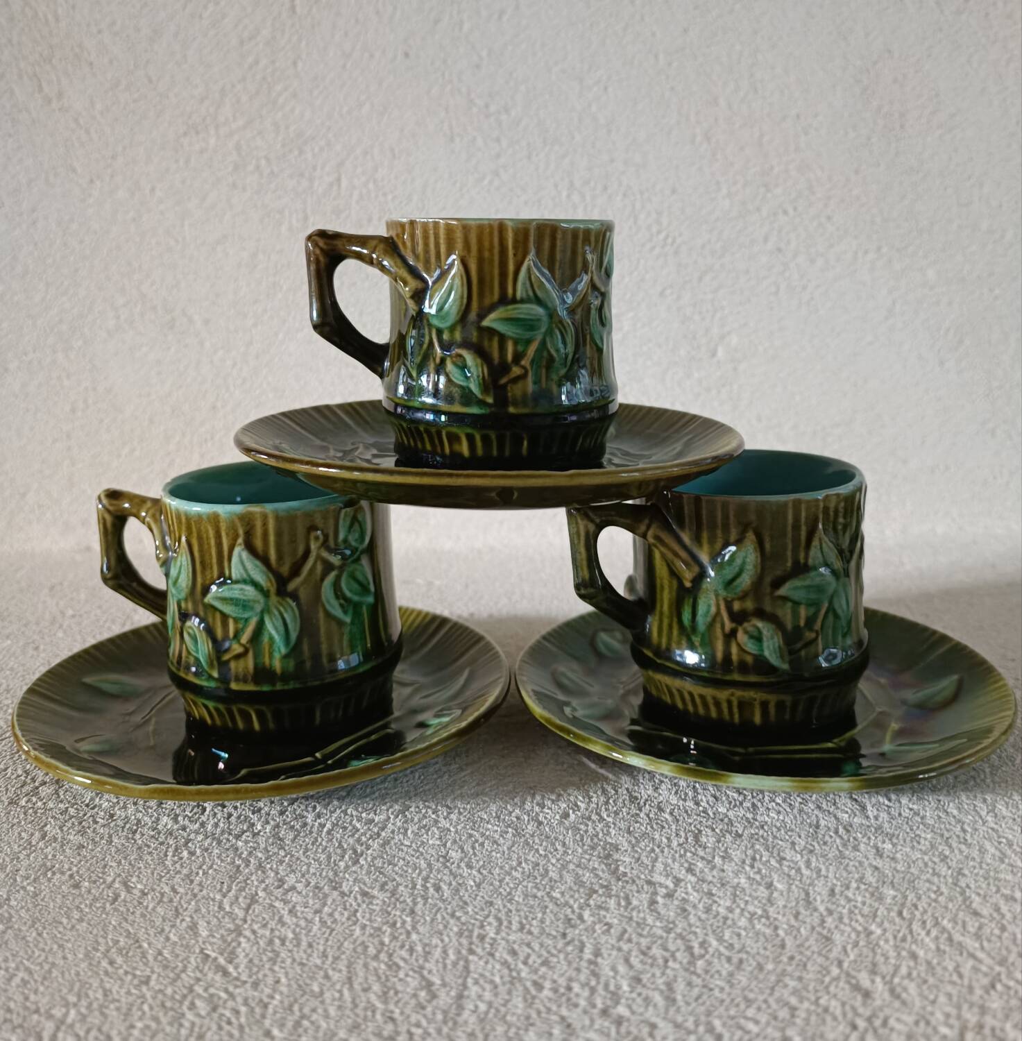 3 cups and saucers in bamboo-decorated earthenware
